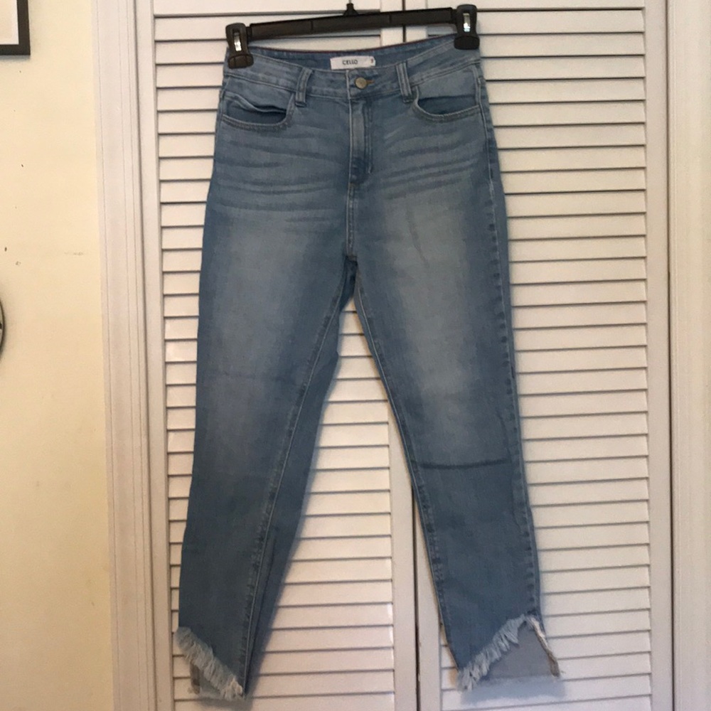 High rise distressed bottom jeans